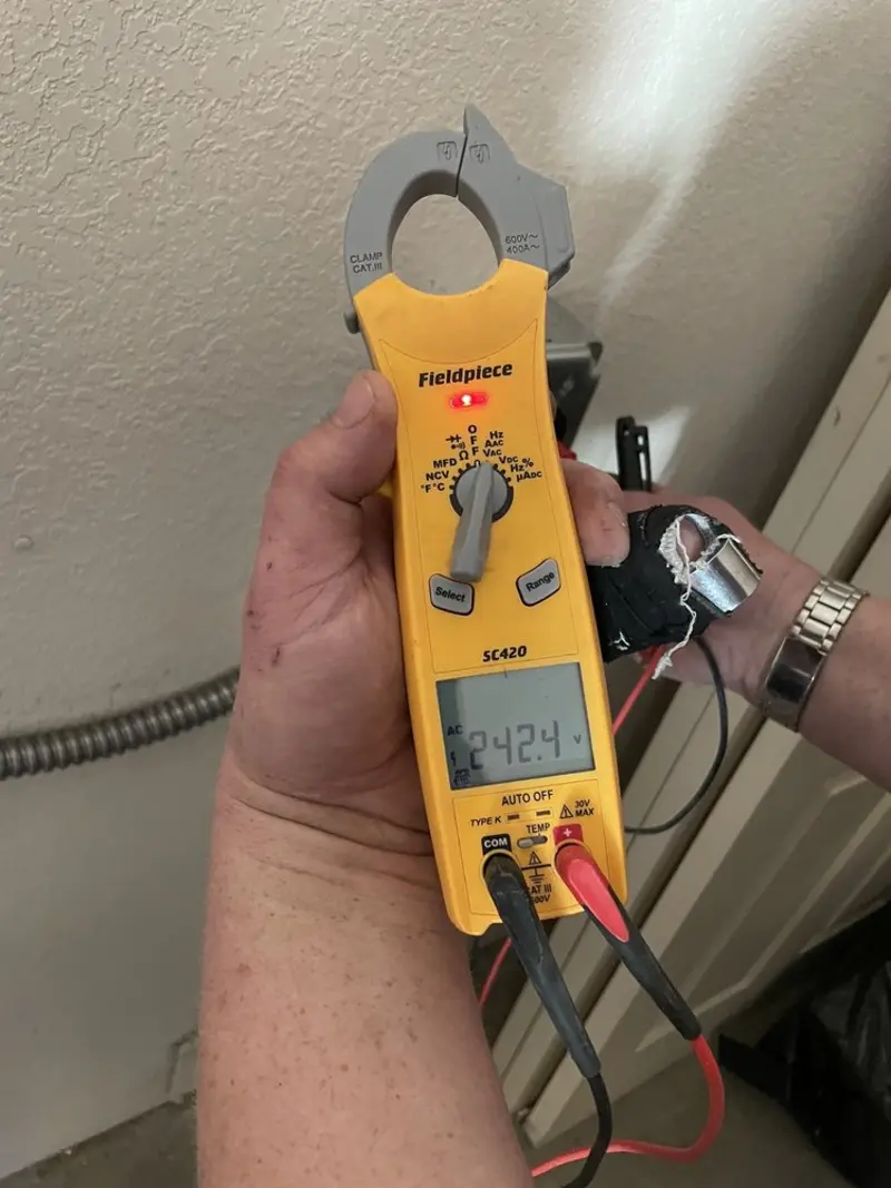 Voltage testing with clamp meter during Generator Installation in Mendota